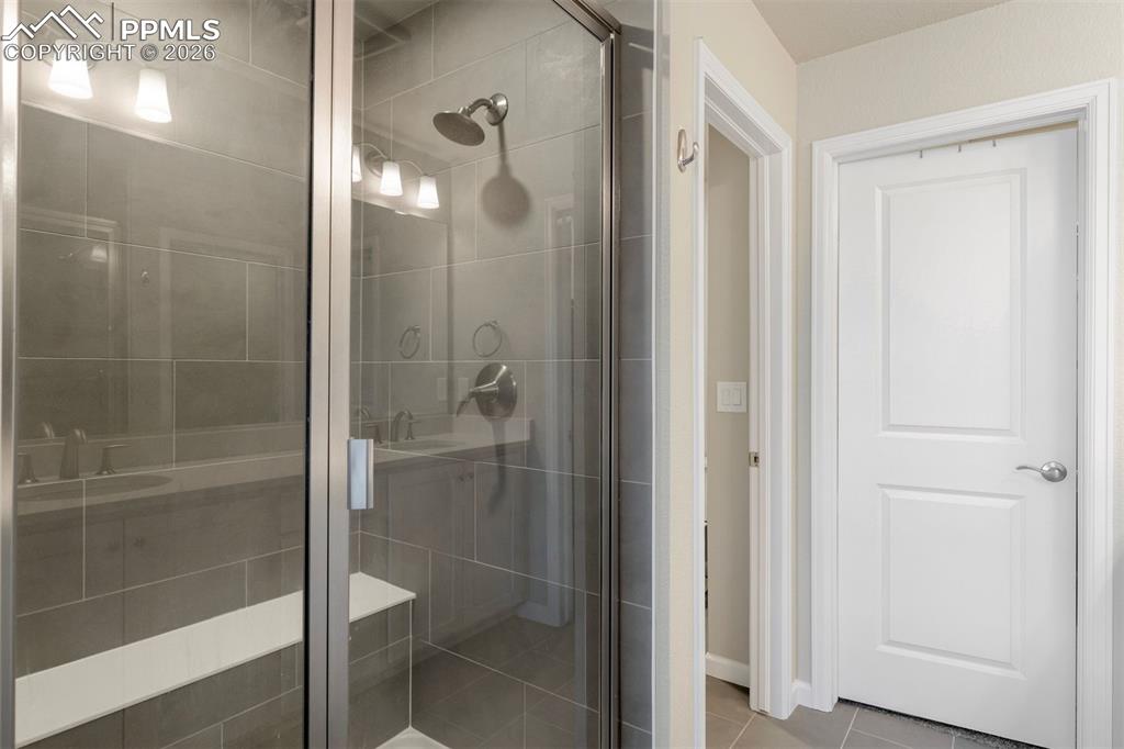Image 17 of 24: Primary Bathroom with water closet and walk in closet