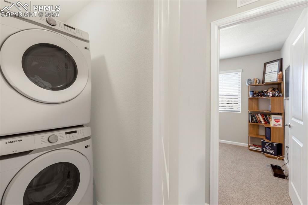 Image 18 of 24: Laundry located on the upper level