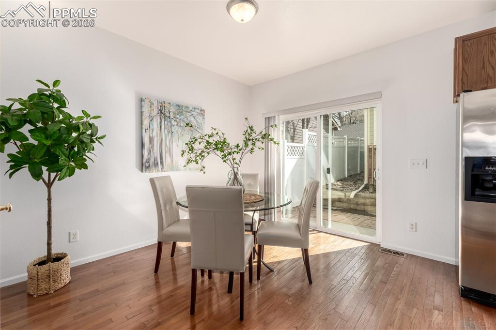 Image 13 of 33: Kitchen flows easily between dining area and main living spaces