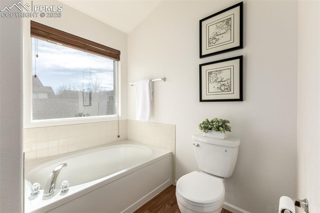 Image 20 of 33: Bathroom featuring a walk in closet