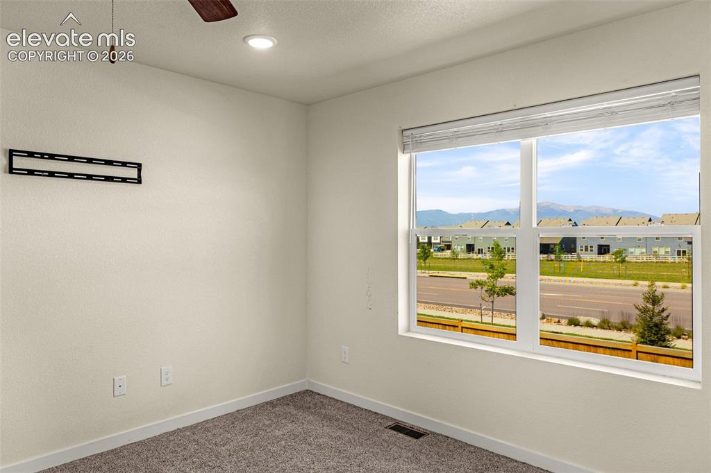 Image 28 of 45: Pikes Peak views from masterbedroom