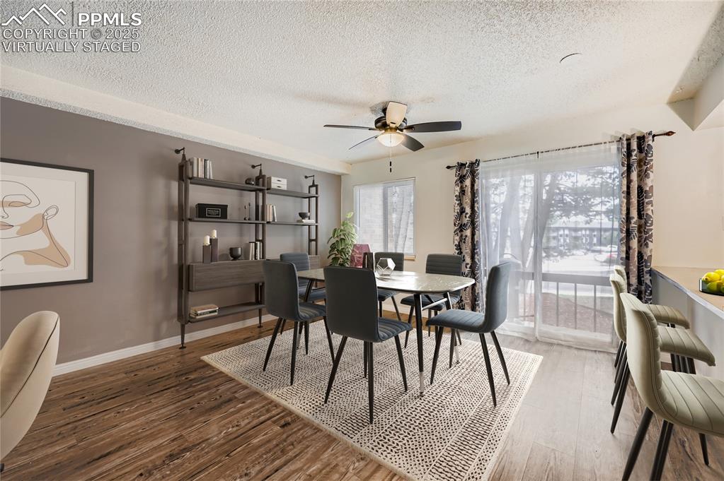Image 11 of 29: Virtually staged dining area to show potential