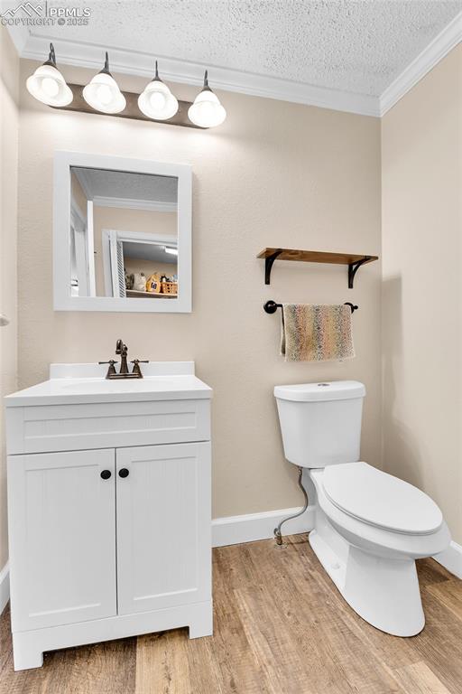 Image 10 of 30: Powder Room that has Laundry in it.