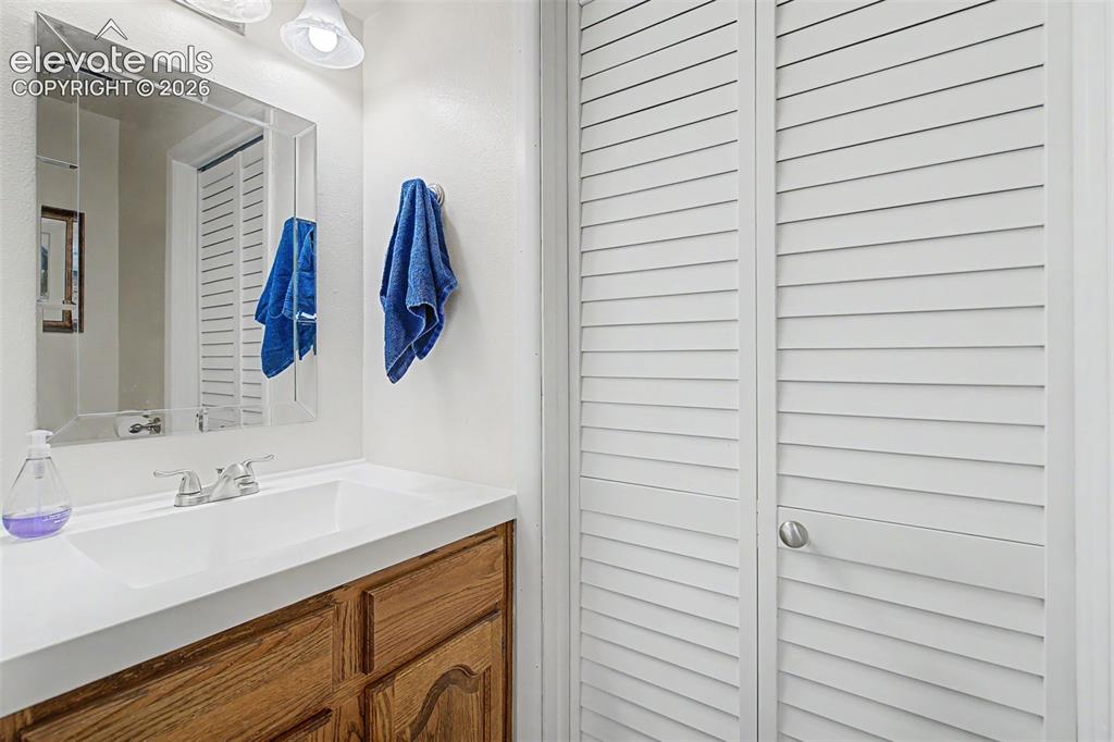 Image 17 of 25: Main level half bath