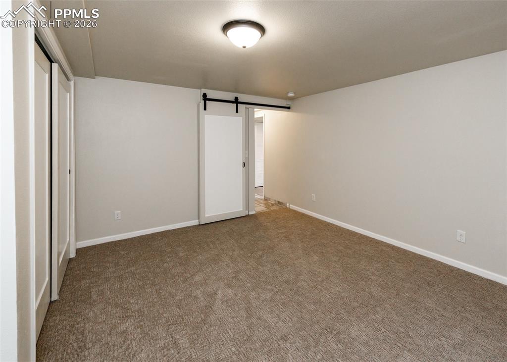 Image 23 of 35: Bedroom #4 Downstairs