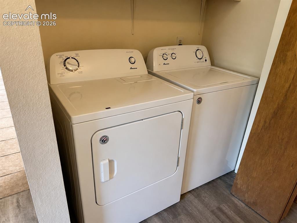 Image 12 of 12: Laundry off of kitchen