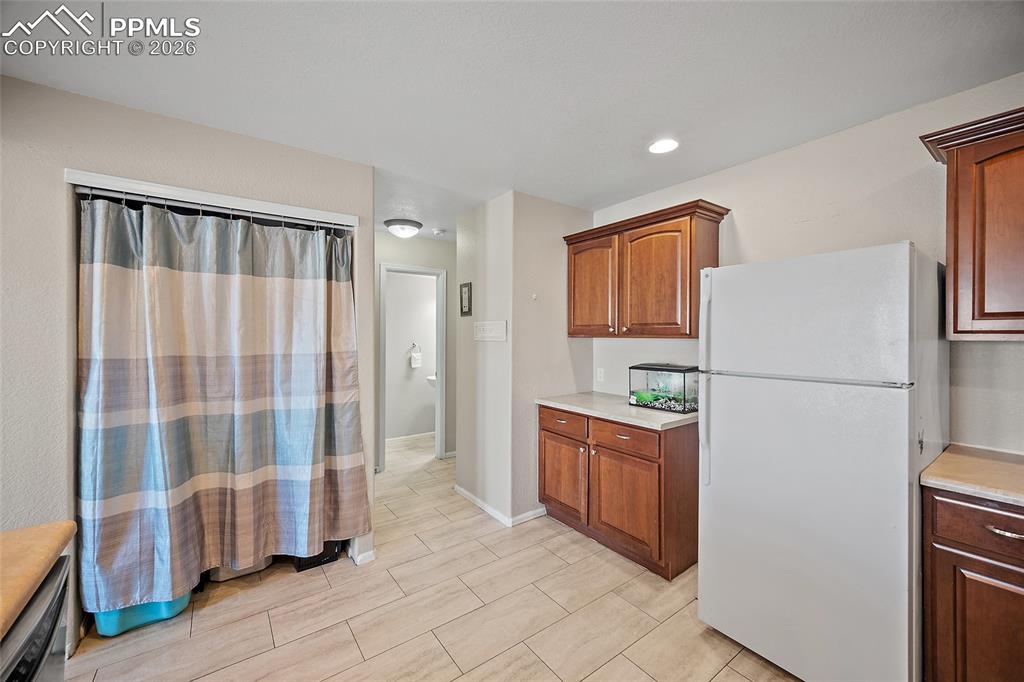 Image 12 of 47: Kitchen and pantry space