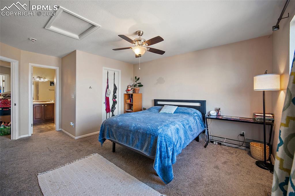 Image 17 of 47: Primary bedroom with ensuite bath