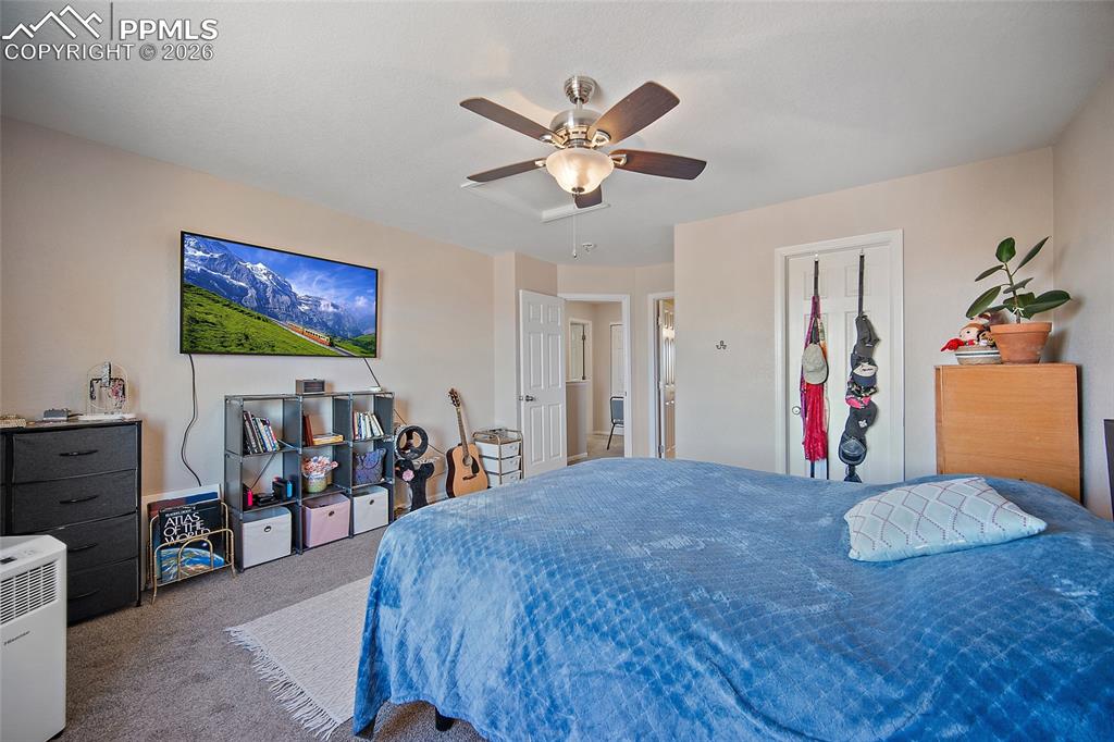 Image 19 of 47: Primary Bedroom with walk-in closet