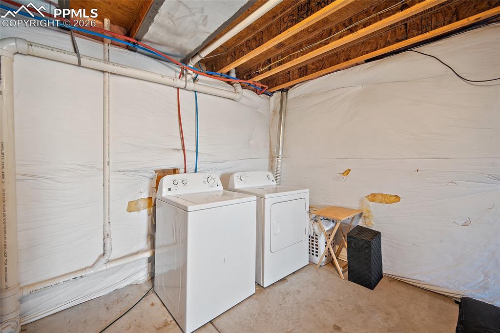 Image 31 of 47: Washer and dryer in the basement
