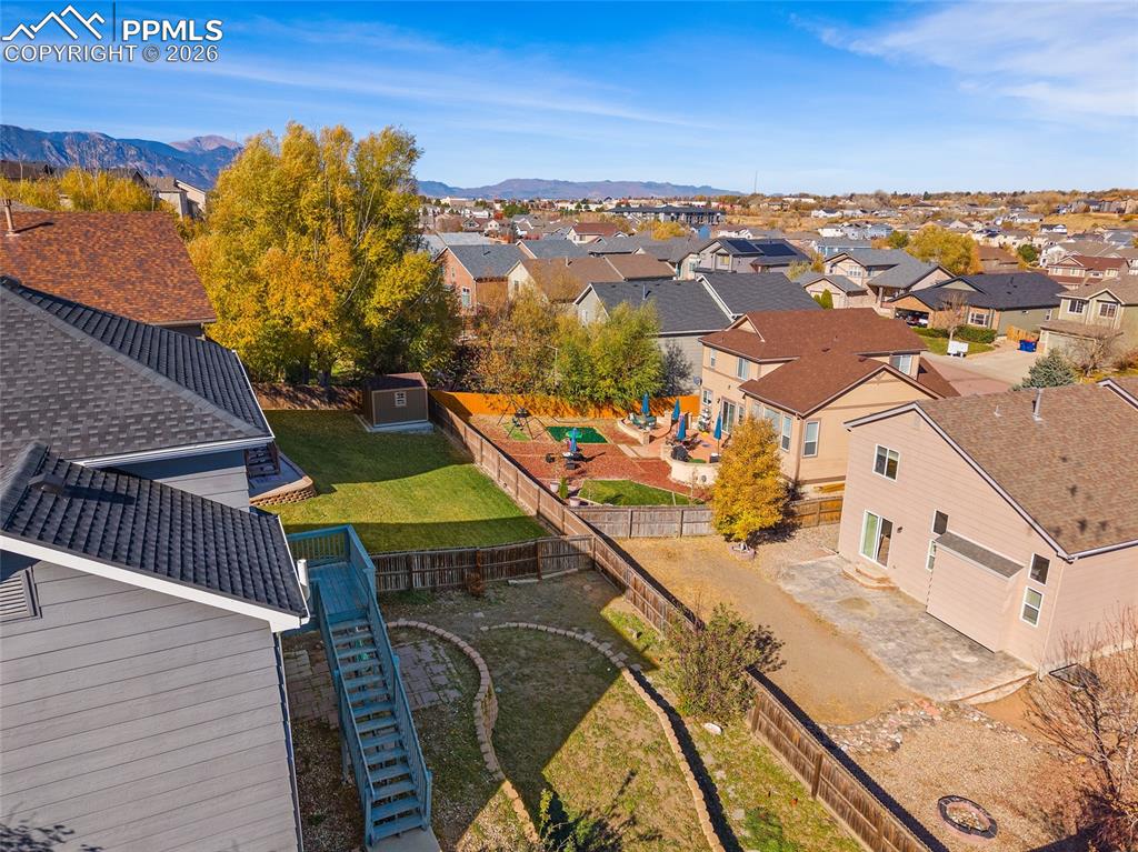 Image 39 of 47: Aerial view with mountains in the background