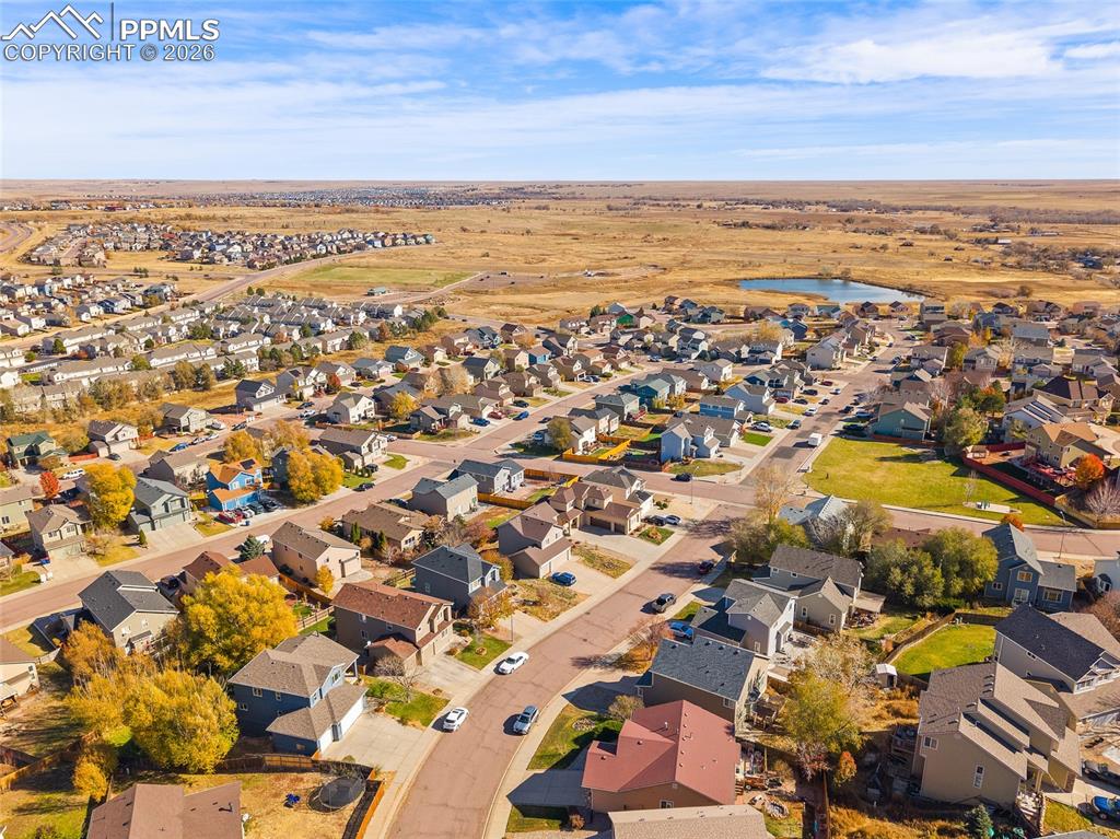 Image 45 of 47: View of property location with nearby pond
