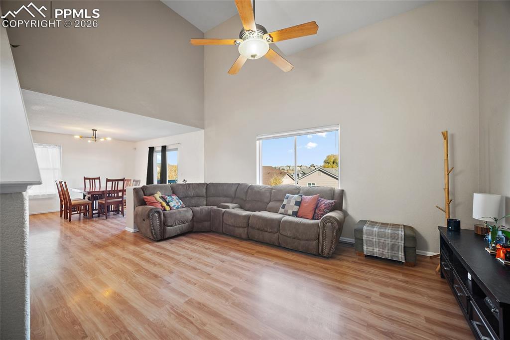 Image 6 of 47: Living room with wood laminate flooring