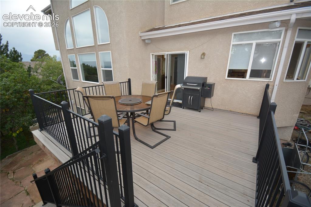 Image 13 of 48: large deck off walk out kitchen. 