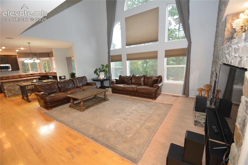 Image 15 of 48: Massive Main level Family room just off kitchen.