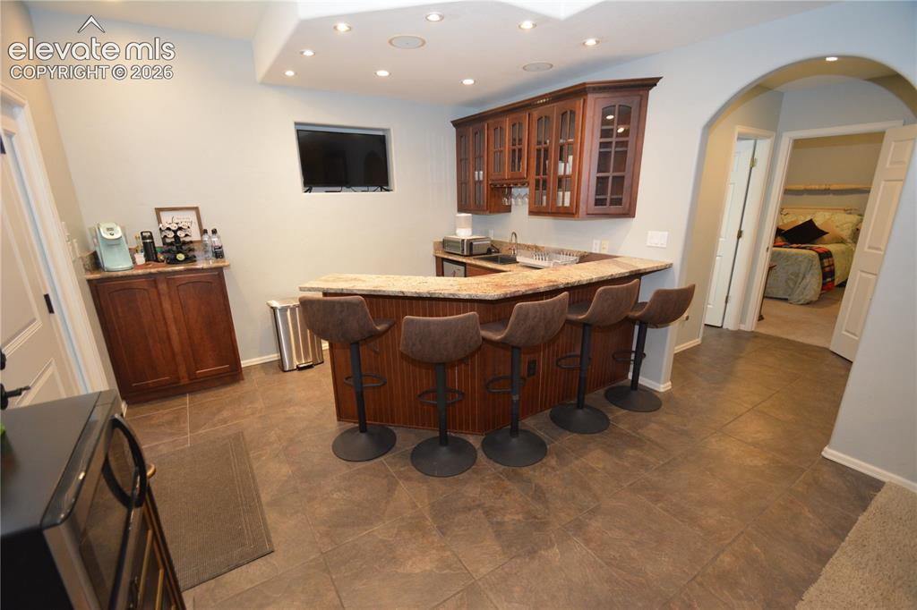 Image 38 of 48: Kitchenette in basement