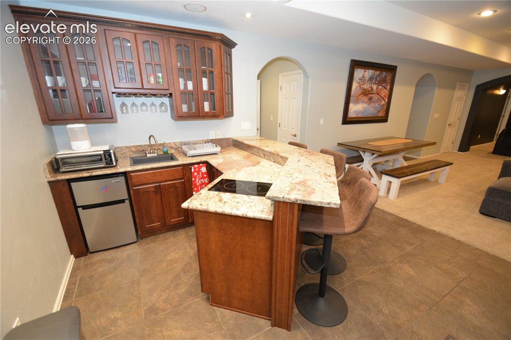 Image 39 of 48: Kitchenette in basement