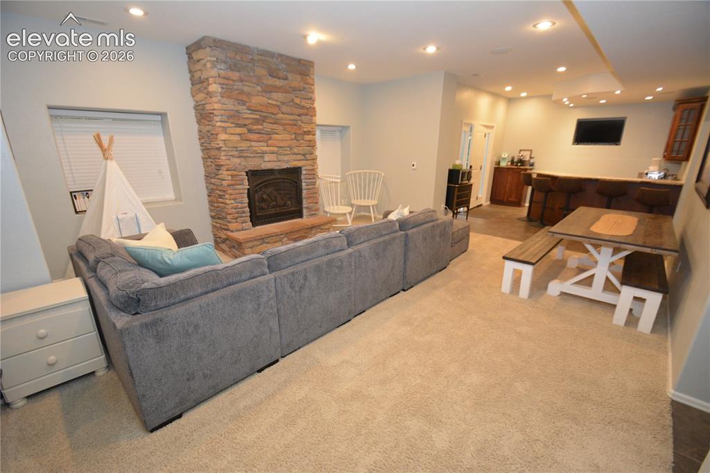 Image 41 of 48: Basement living room.