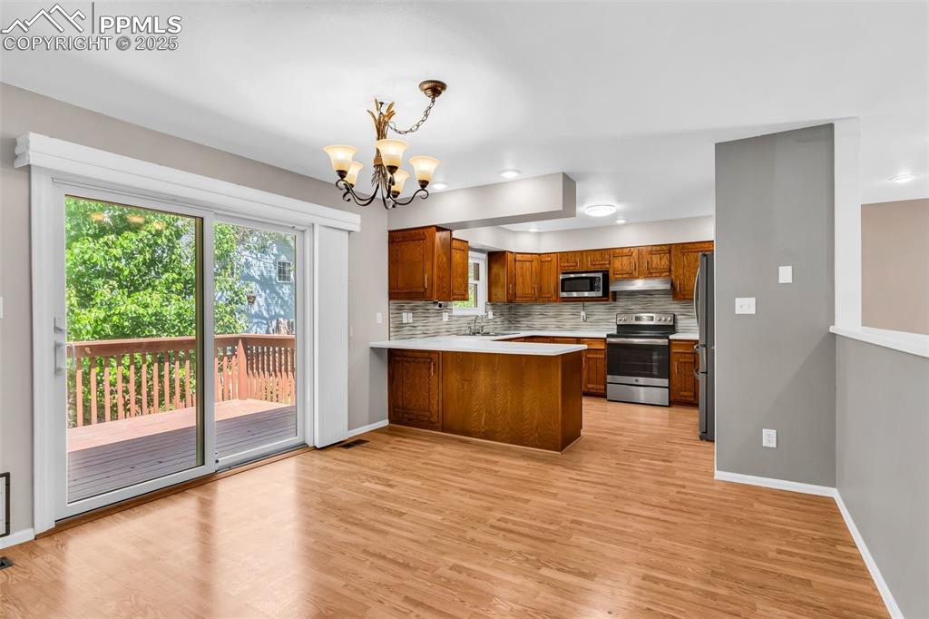 Image 12 of 41: Kitchen/Dining