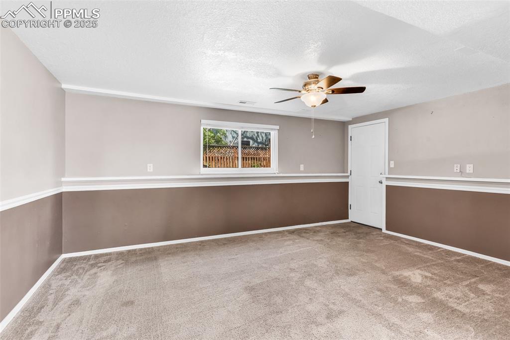Image 20 of 41: Extra living/game room/office in lower level