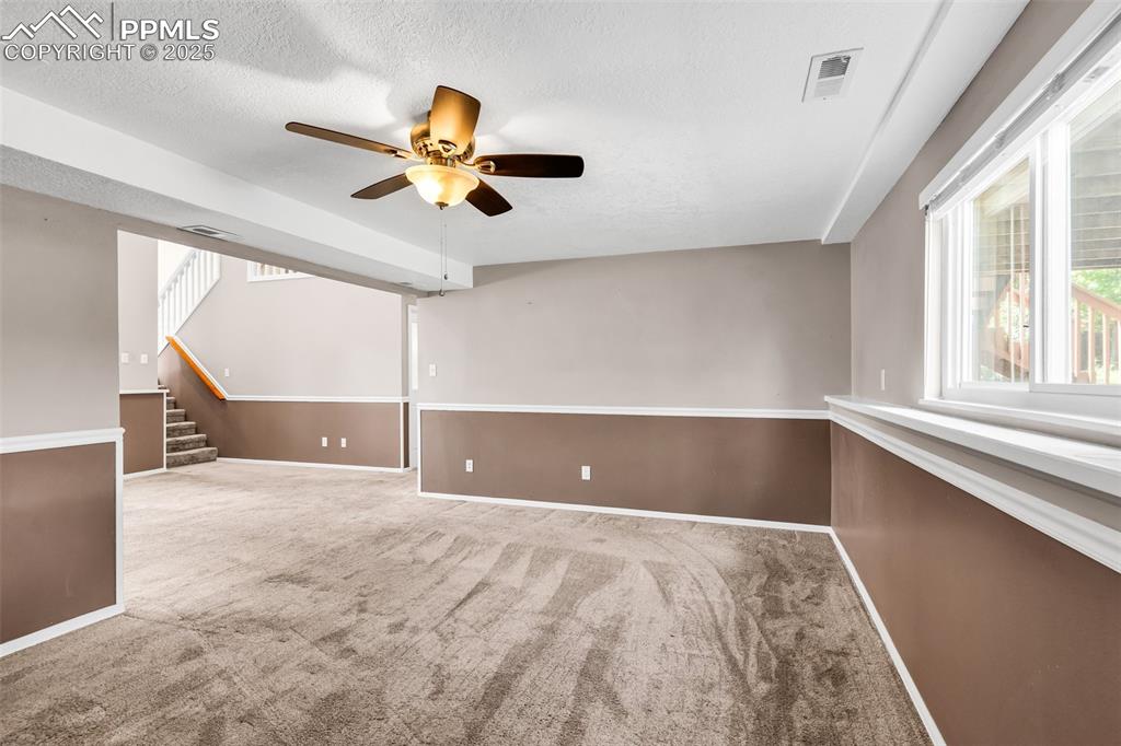 Image 21 of 41: Extra living/game room/office in lower level