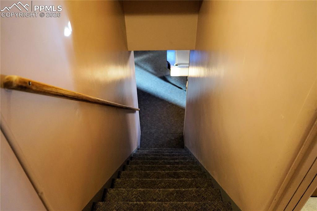 Image 16 of 40: stairs leading to basement