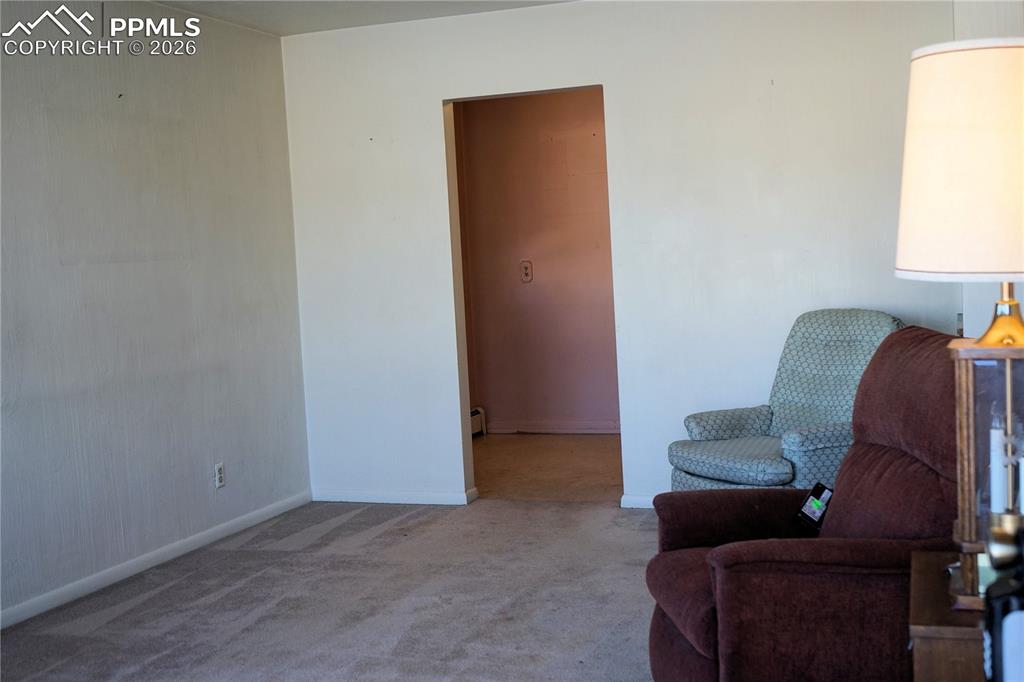 Image 5 of 40: Leads to the dining area and kitchen