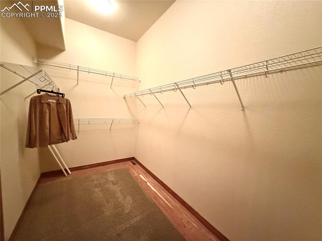 Image 22 of 45: Walk in Closet (Primary)