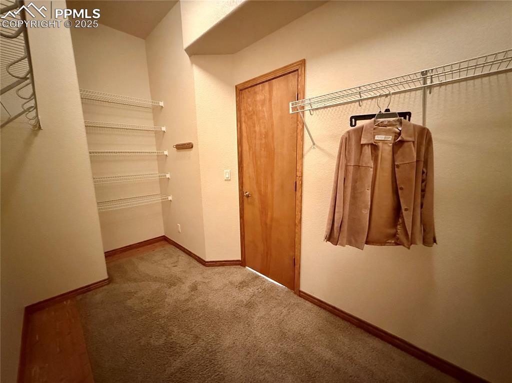 Image 23 of 45: Walk in Closet (Primary)