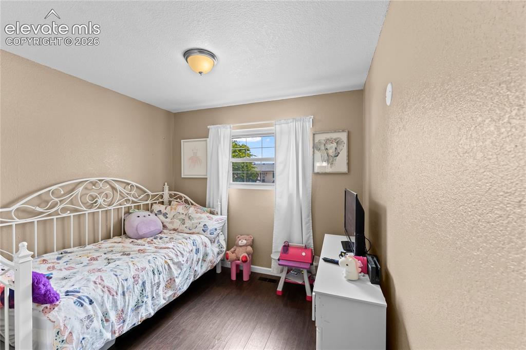 Image 17 of 38: Bedroom