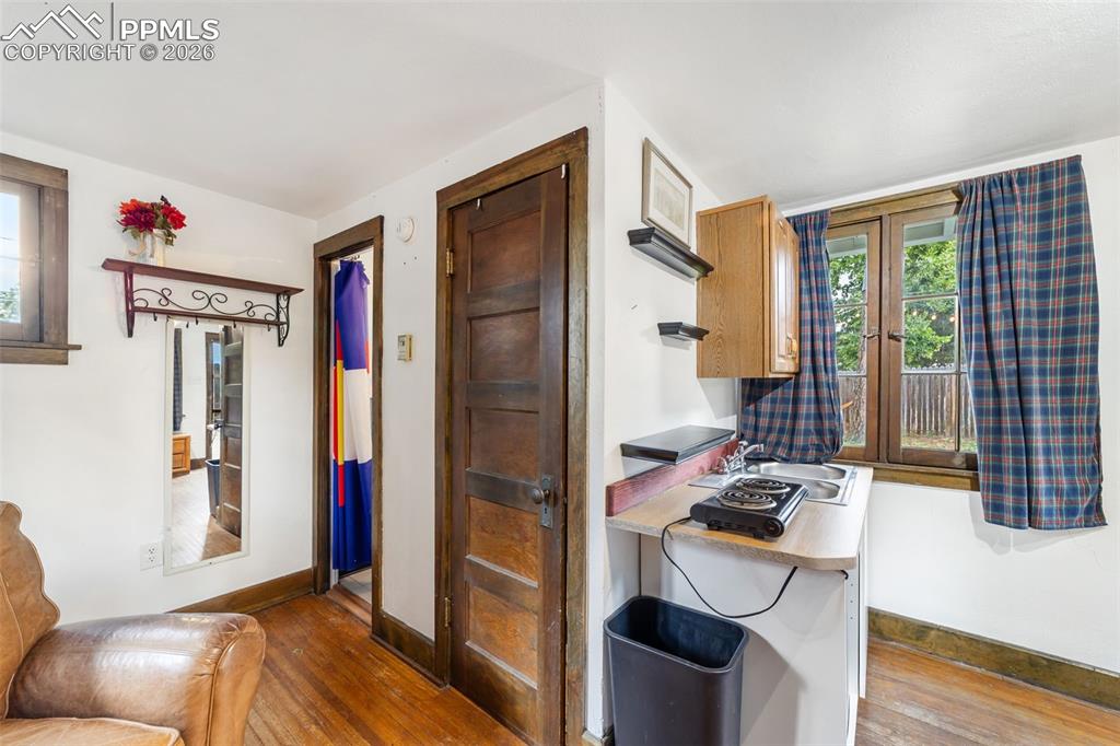 Image 28 of 50: Adorable cottage complete with a kitchenette and a 3/4 bath