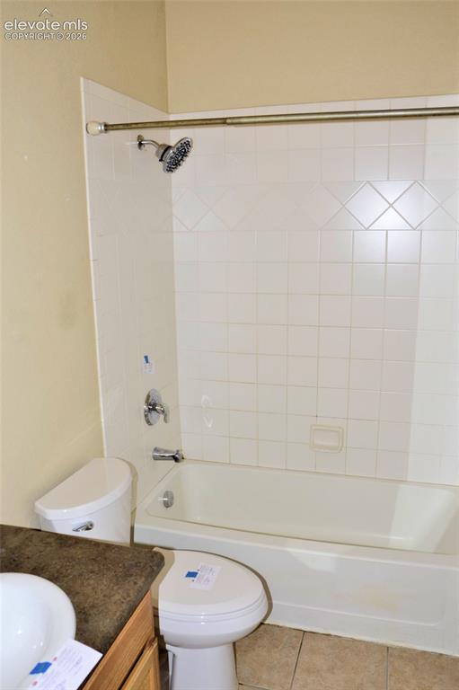 Image 10 of 15: Upstairs hall bathroom
