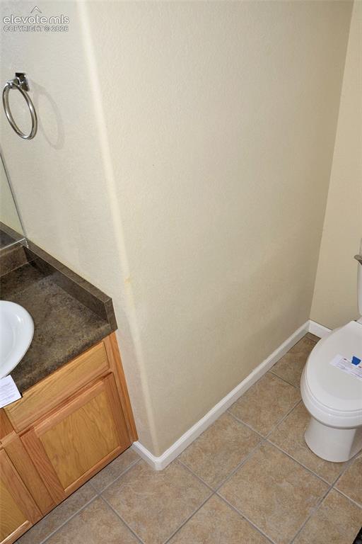 Image 6 of 15: Main level half bath
