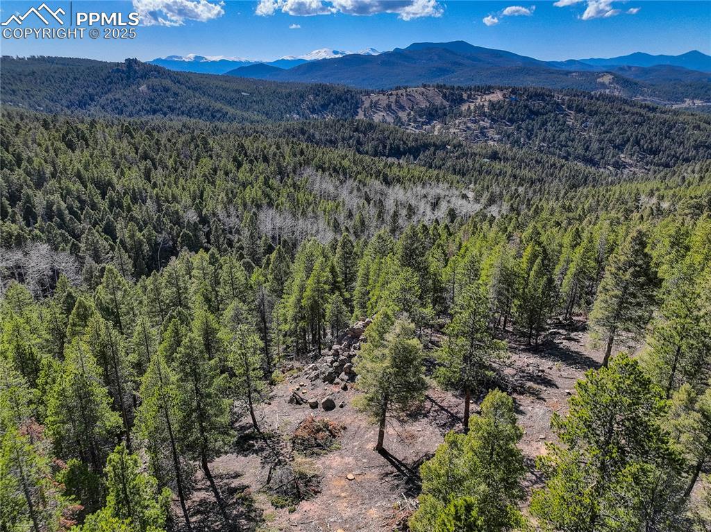 Image 15 of 19: Aerial view of a mountainous background