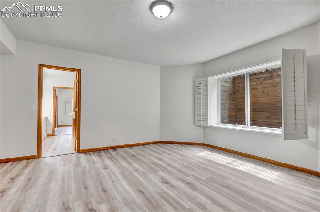 Image 17 of 44: Bedroom with ensuite