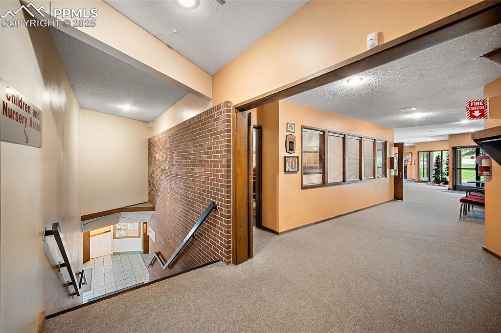 Image 20 of 49: Lobby to lower level