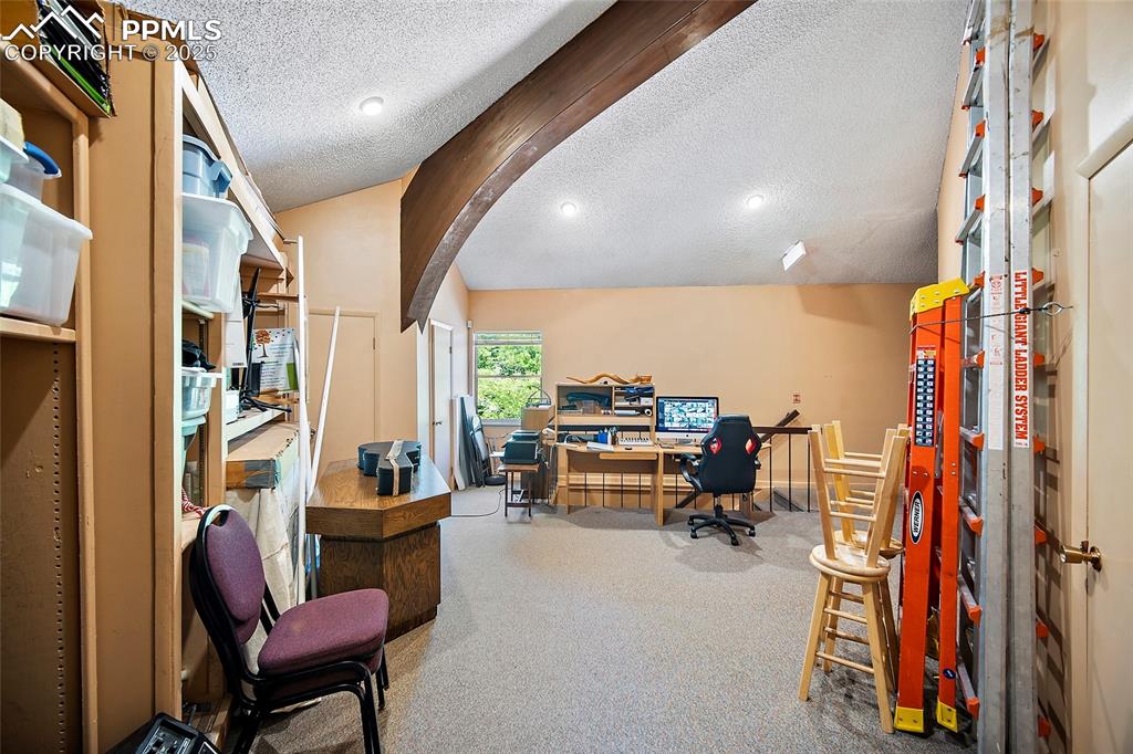 Image 40 of 49: Small room behind sanctuary used for security camera monitoring