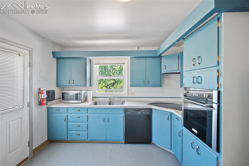 Image 42 of 49: Kitchen in second building