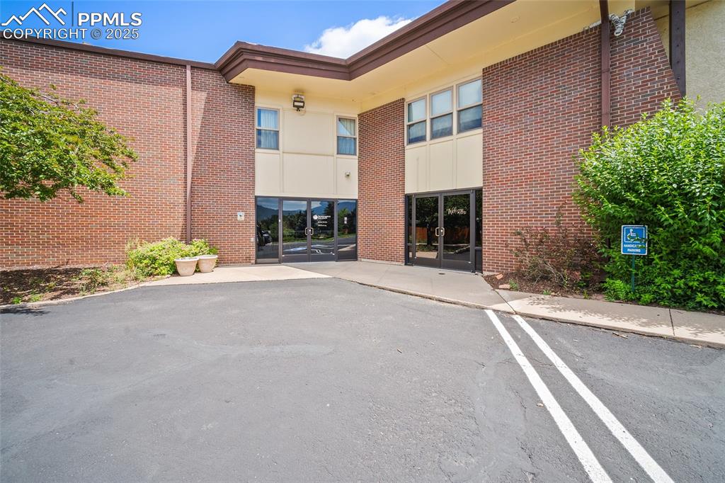 Image 6 of 49: Entrance from parking lot on Fontanero Street