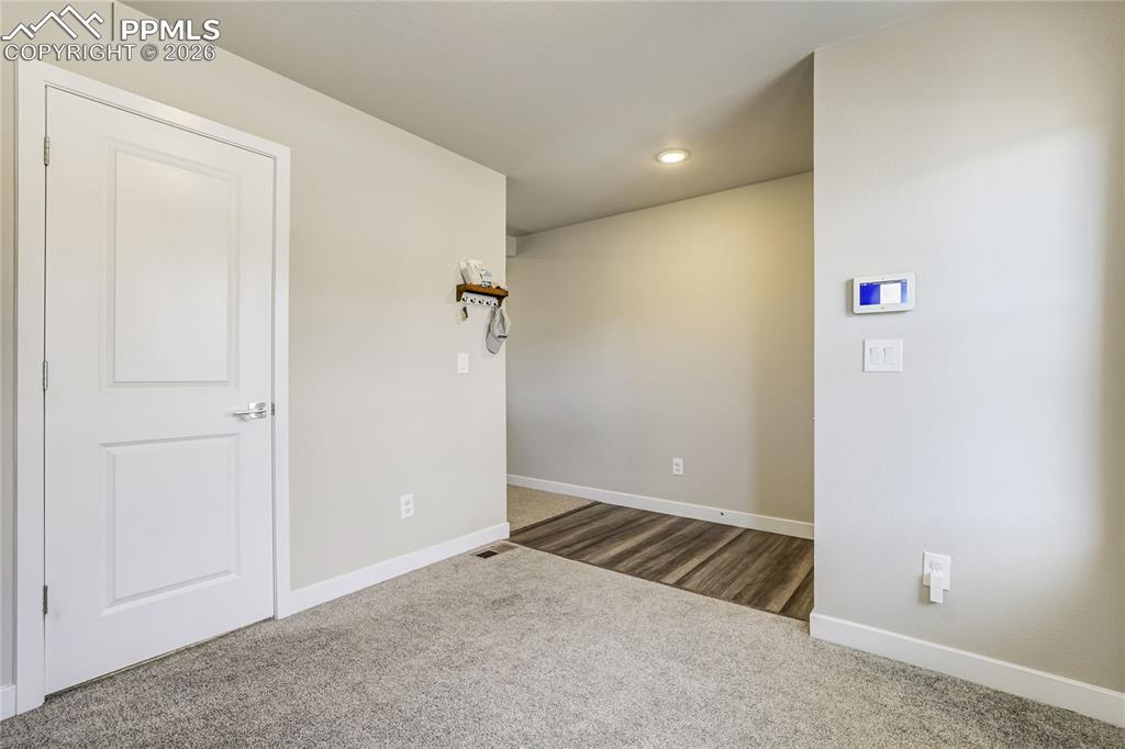 Image 4 of 45: Entry way with office to the left