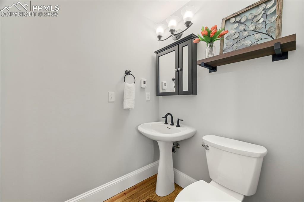 Image 15 of 50: Main level half bath