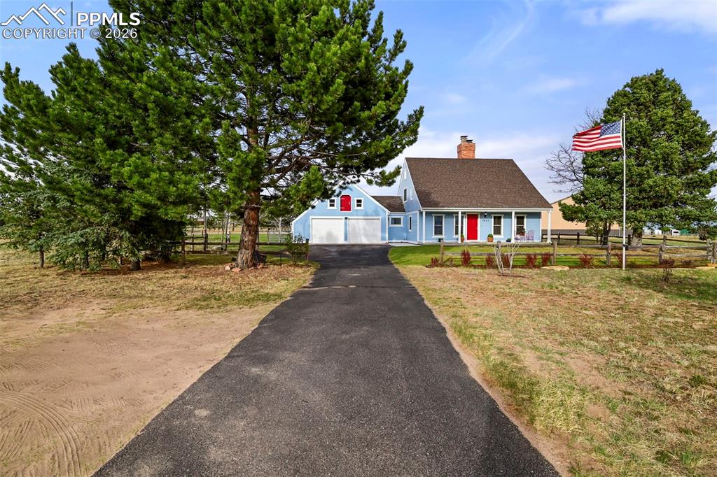 Image 2 of 50: Set back with mature trees for extra serenity.