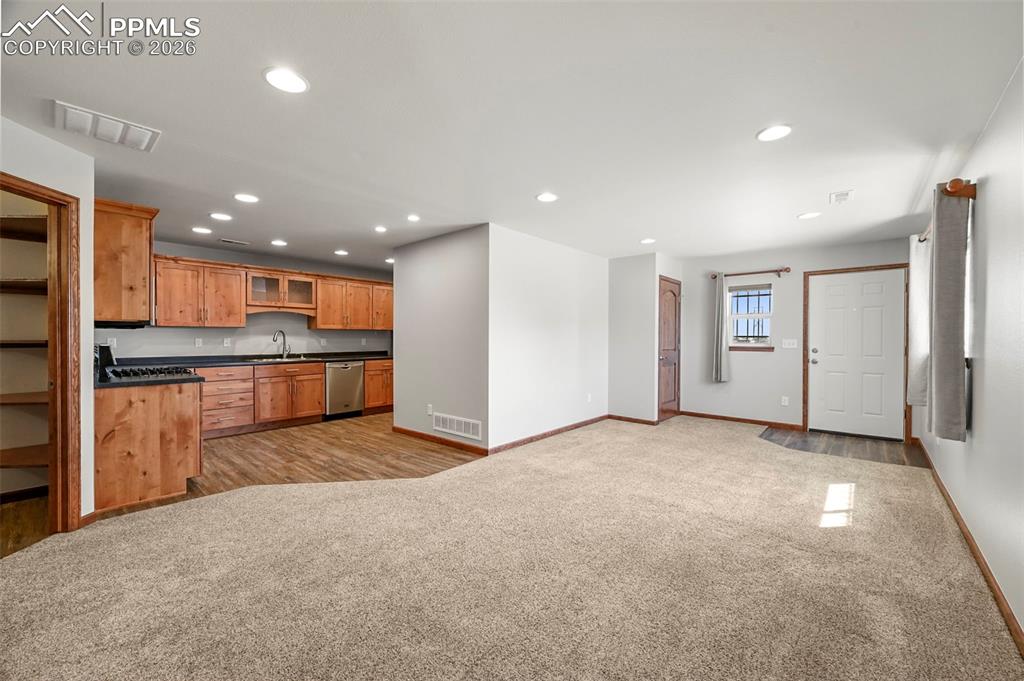 Image 31 of 50: Barndo: Livingroom and Kitchen