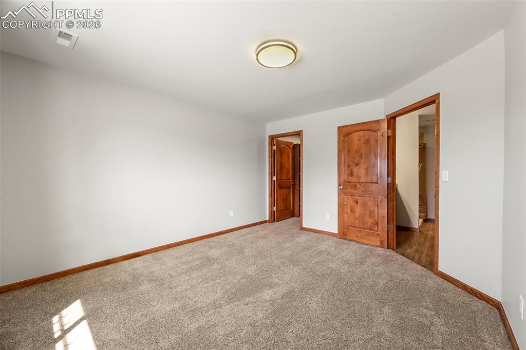 Image 36 of 50: Barndominium: Large Bedroom