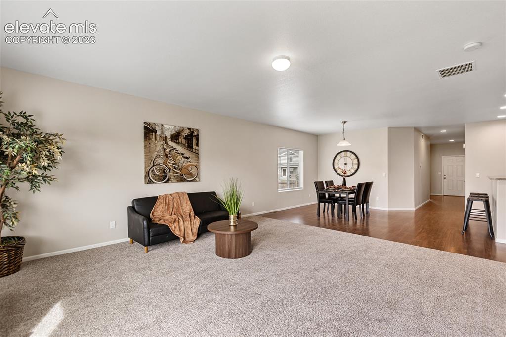 Image 14 of 46: This living room is ready for large furniture - it