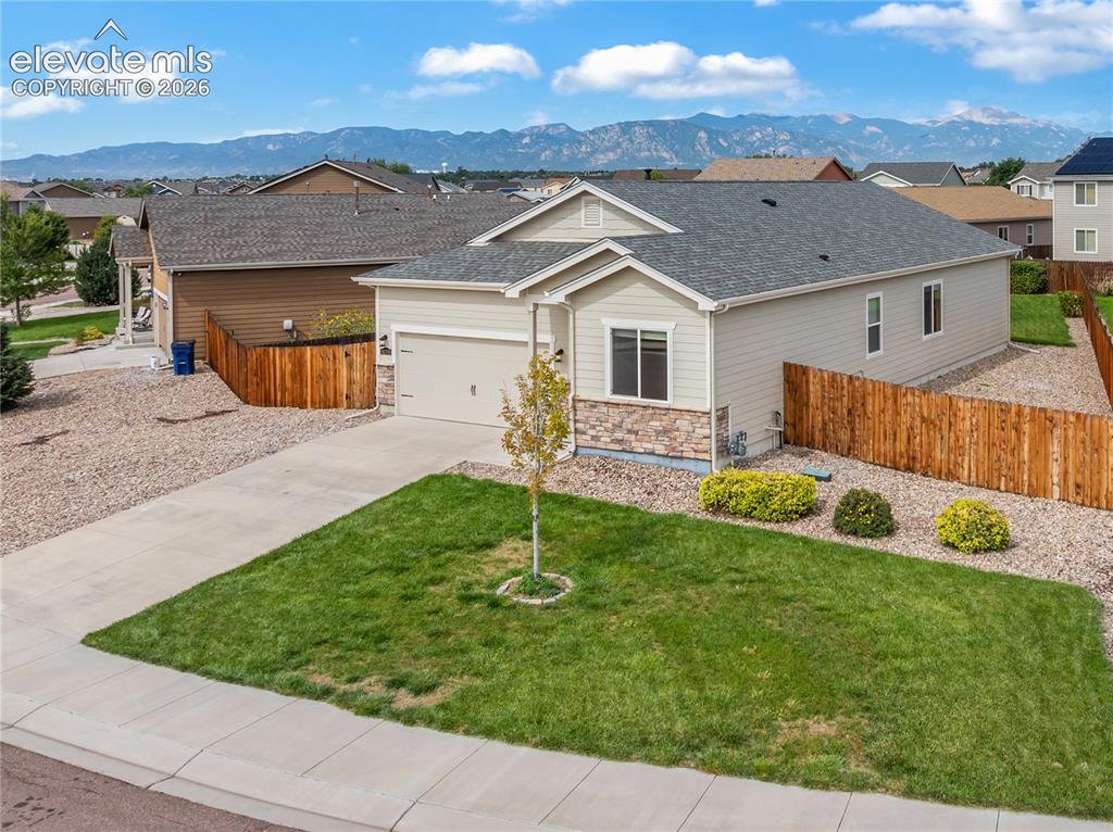Image 2 of 46: This sparkling clean, move in ready home, is situated on a large lot and is