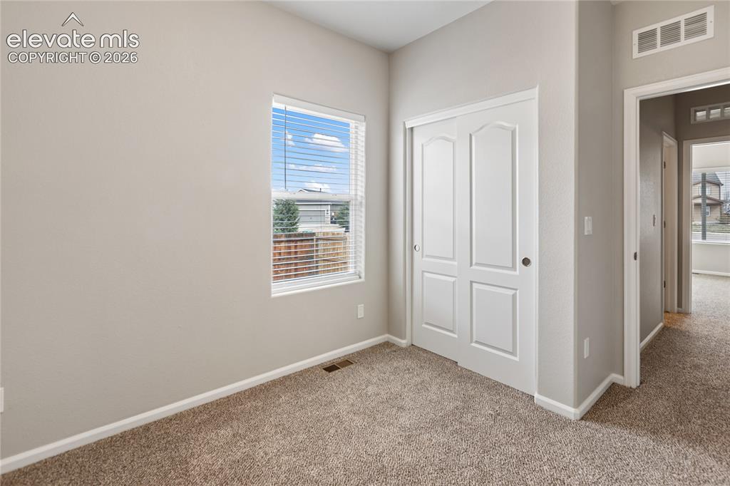 Image 36 of 46: Bedroom #2 - new carpet with upgraded pad, freshly painted