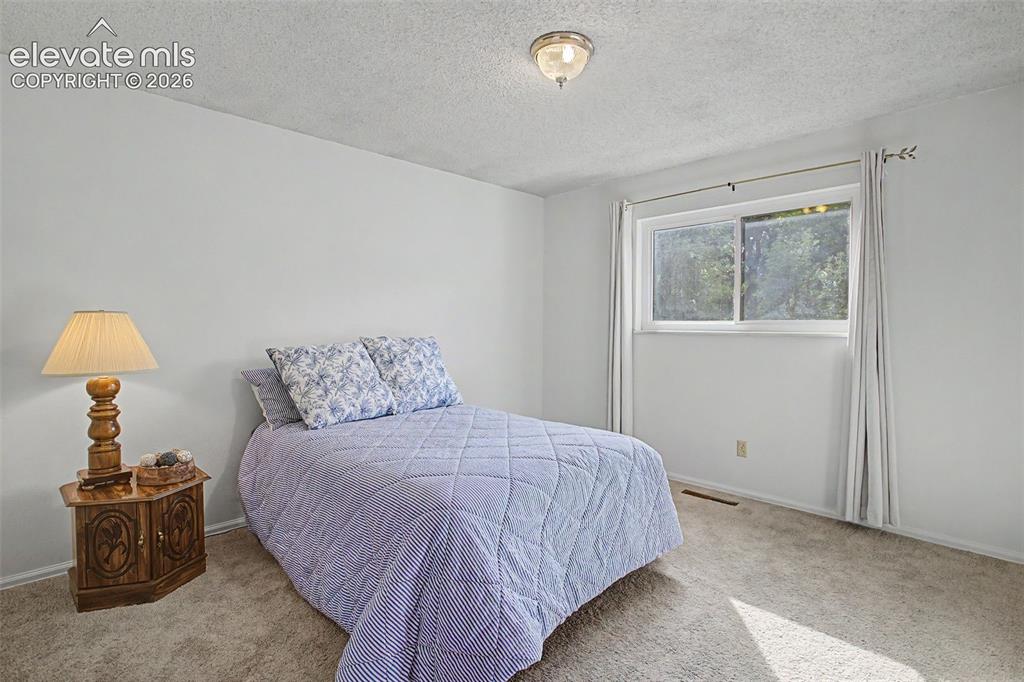 Image 8 of 15: Master Bedroom