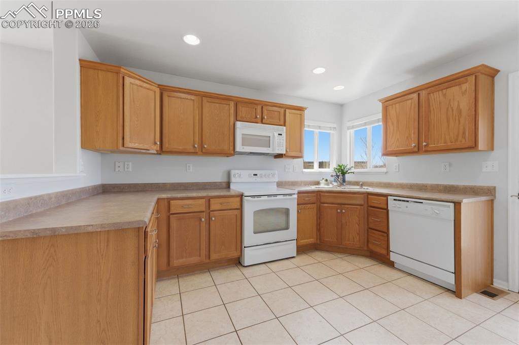 Image 4 of 34: Large Kitchen provides ample room to move about and meal preparation 