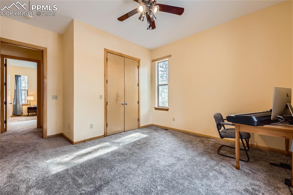 Image 30 of 50: Office with carpet flooring, baseboards, and ceiling fan